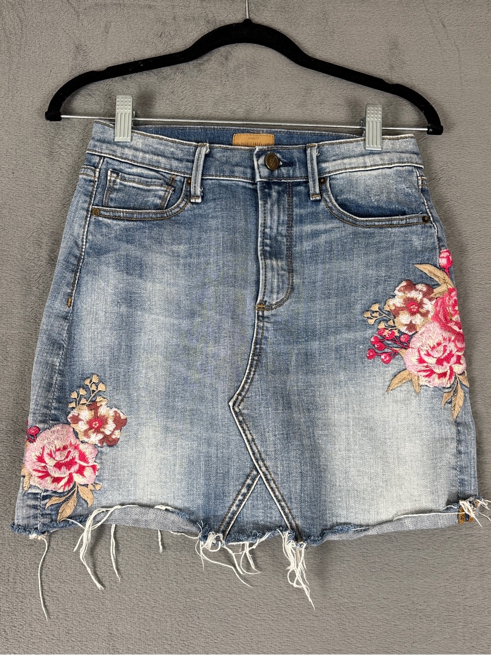 DRIFTWOOD Distressed Light Blue Denim Mini Skirt with Pink Floral Embroidery